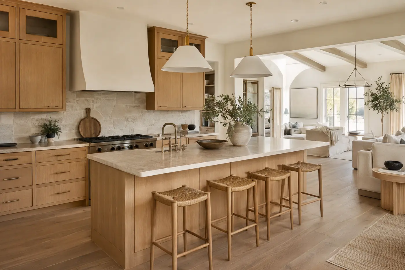 Organic modern kitchen with white oak cabinetry and natural stone