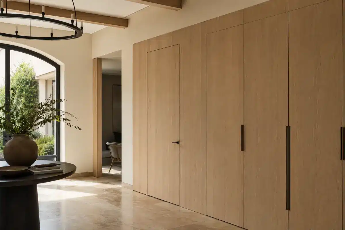 Luxury entry with concealed door and integrated storage