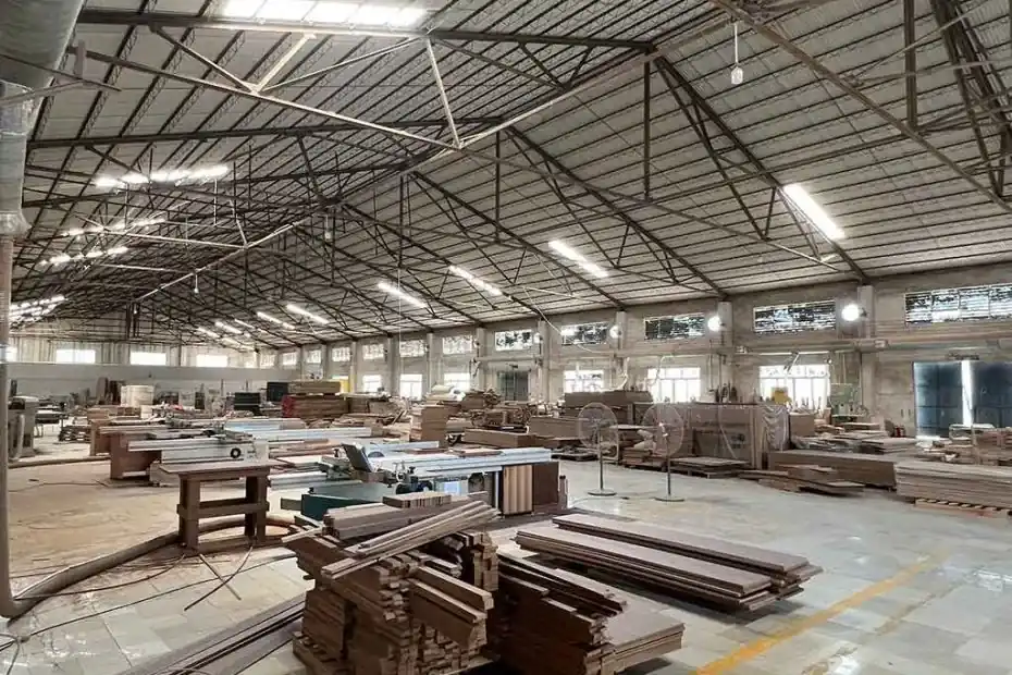 Woodworking equipment and components inside the factory shown on George Group’s website