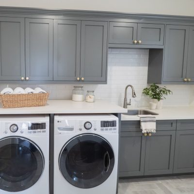gray cabinets in laundry room​